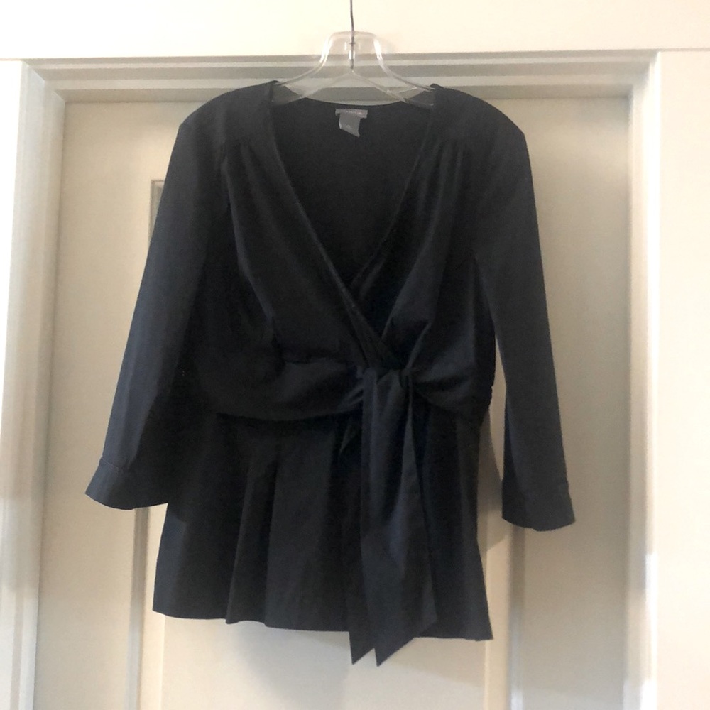 Long sleeved Ann Taylor fitted blouse with nice trim around neck & sleeves